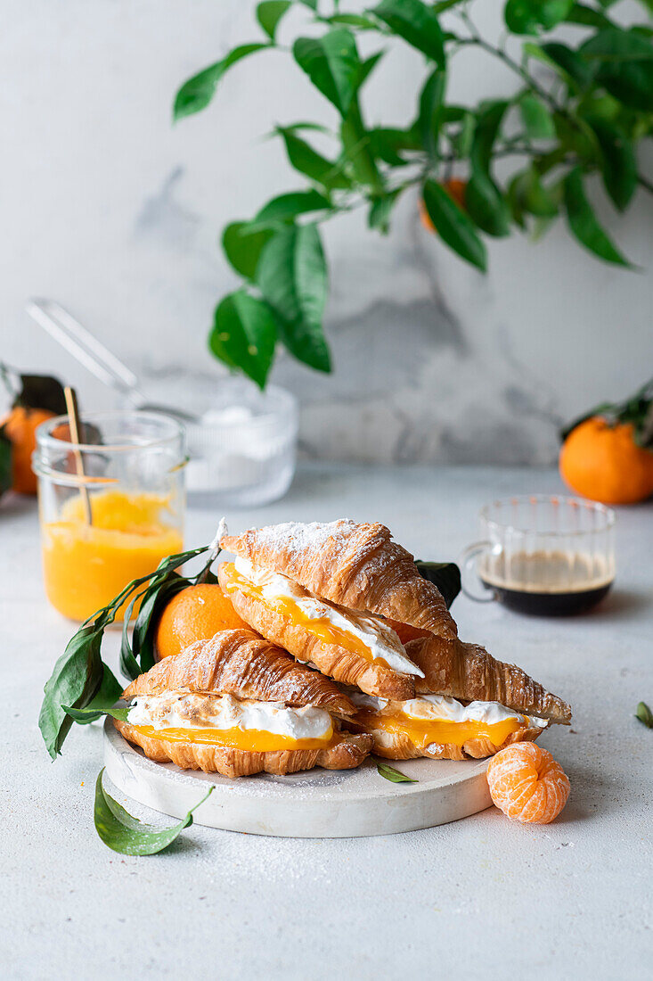 Croissants with clementine quark and meringue
