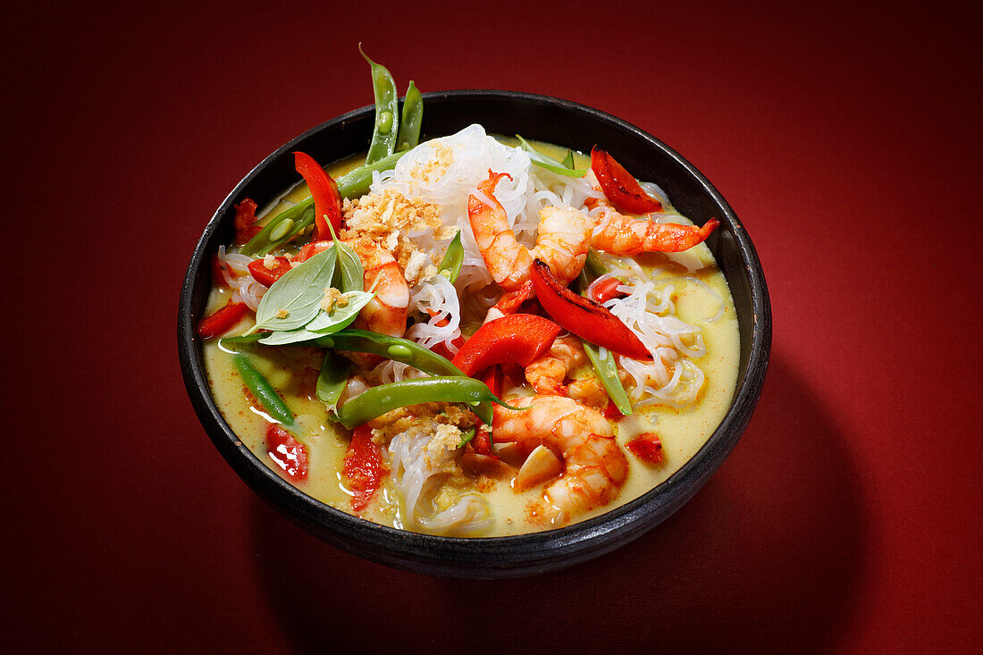 Malaysian soup with shrimp and sugar snaps