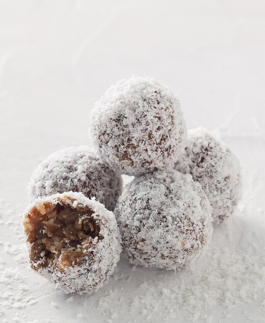 Bliss balls made from whole wheat biscuits, dates and coconut flakes