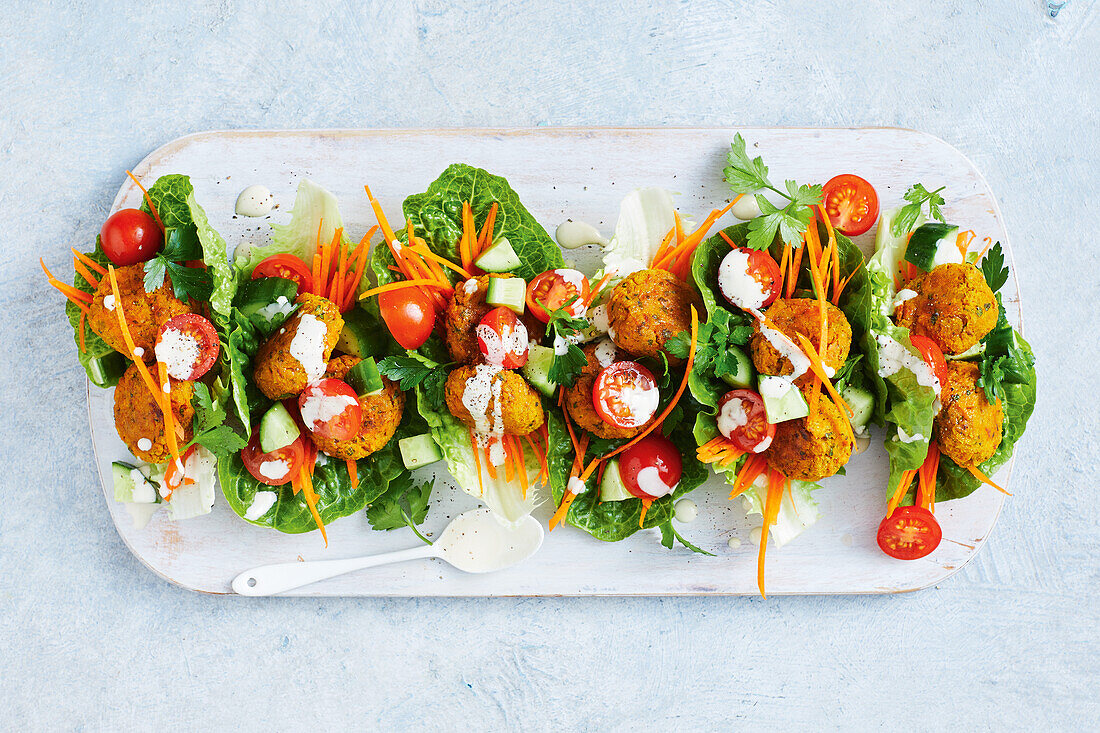 Falafel salad in lettuce leaf cups