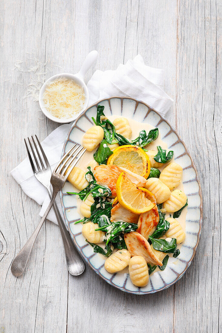 Gnocchi with roast chicken breast, spinach and lemon