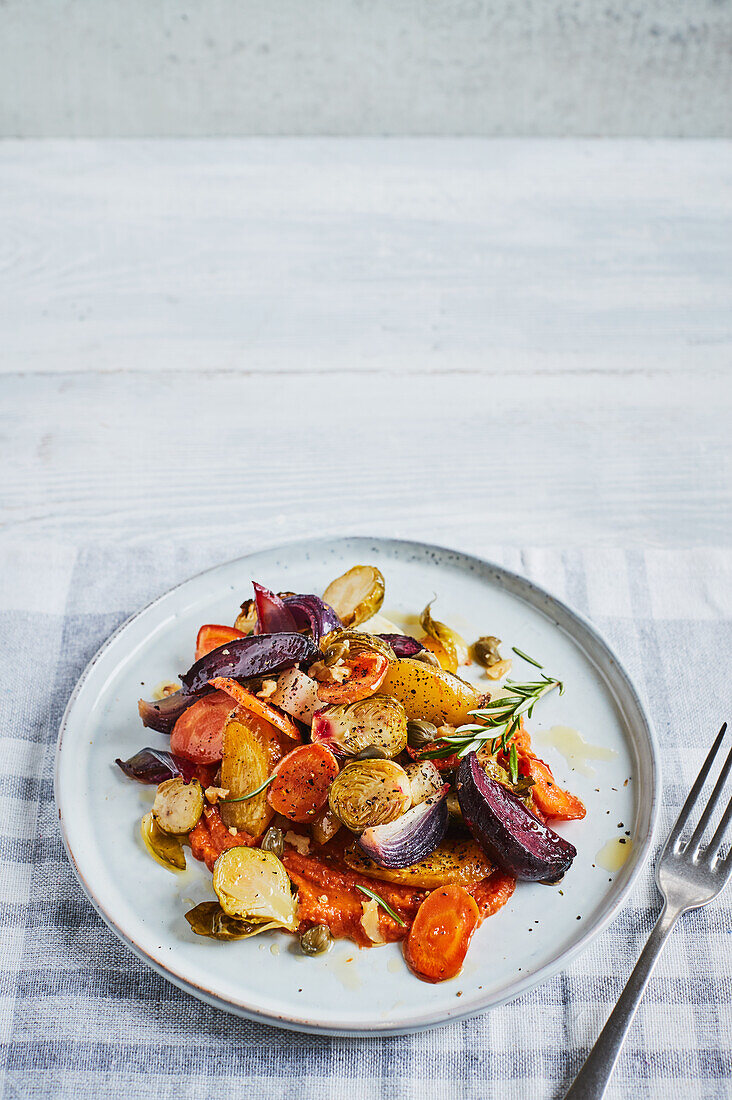 Colorful antipasti with walnuts from the tray