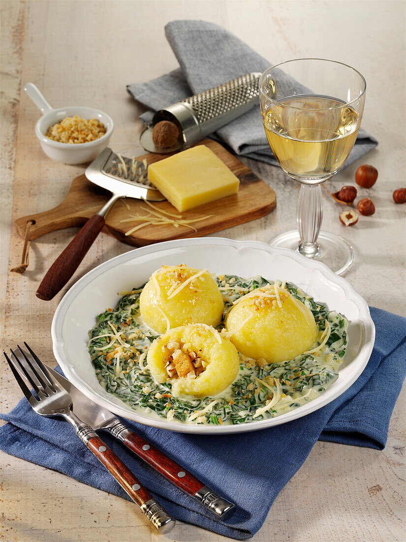 Florentine-style potato dumplings with spinach and cheese vegetables