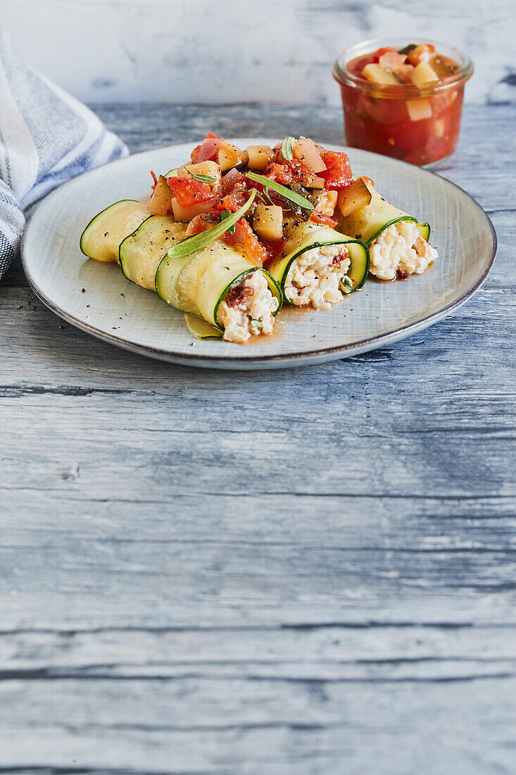Vegan courgette cannelloni with vegetable and rice filling