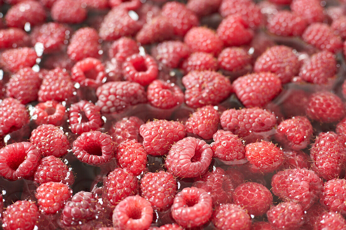 Raspberries in water
