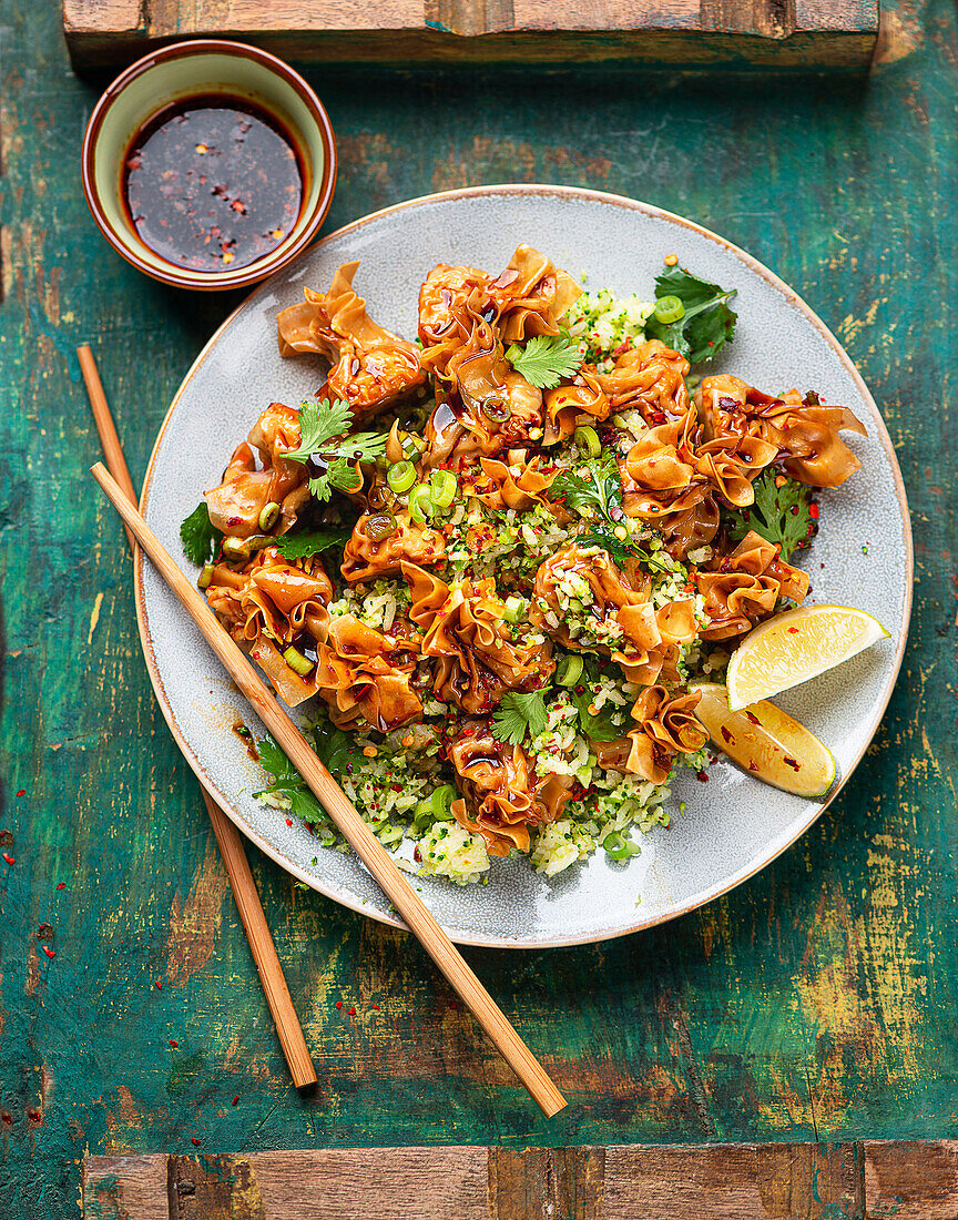 Chinese dumplings with broccoli rice