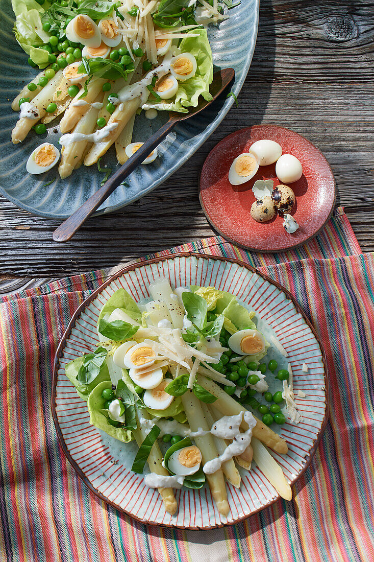 Marinated asparagus with peas and quail eggs