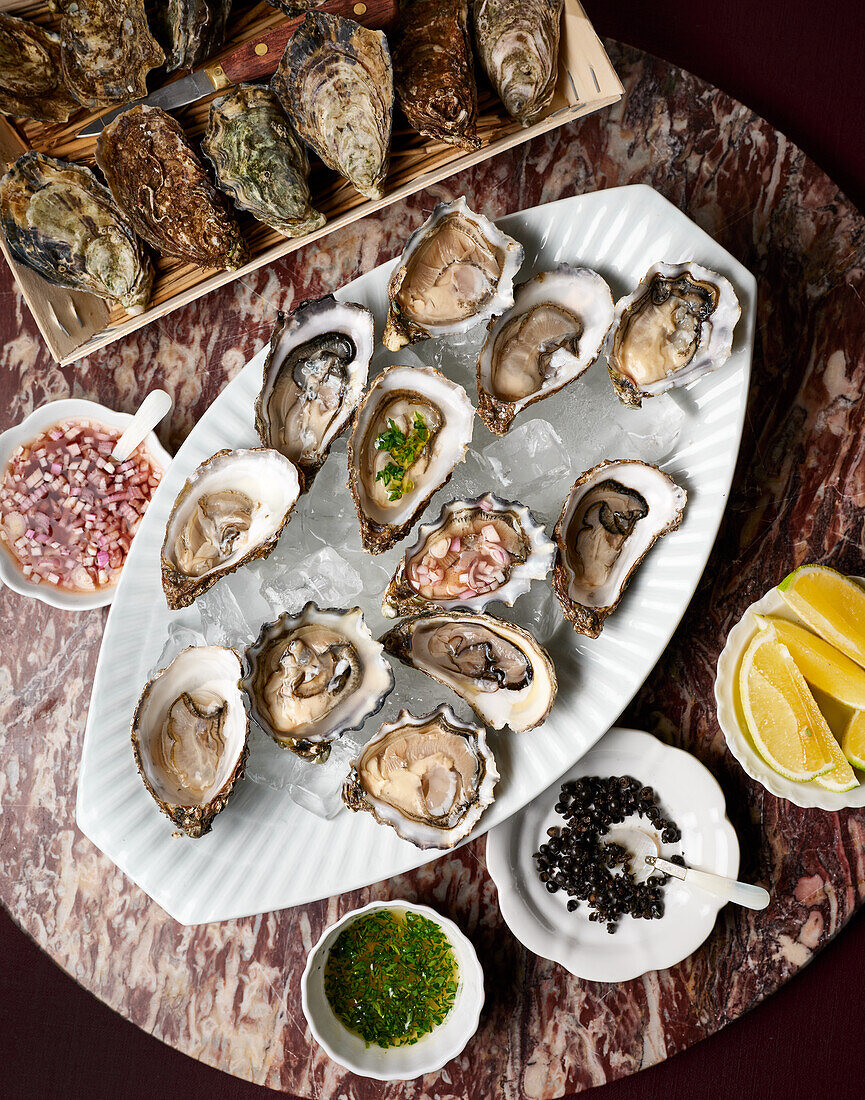 Oyster trio with fermented pepper, tarragon vinaigrette, red wine shallot vinaigrette