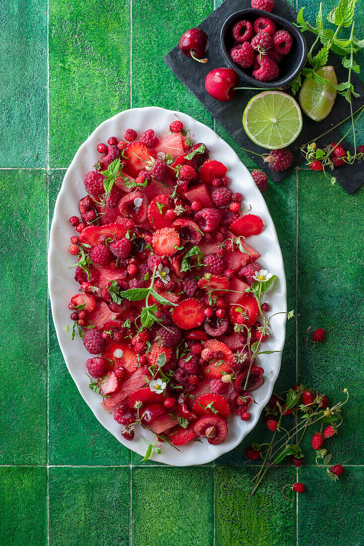 Red berry salad with watermelon and mint