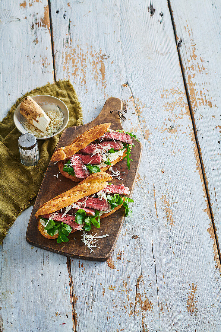 Choux pastry sandwiches with beef and horseradish