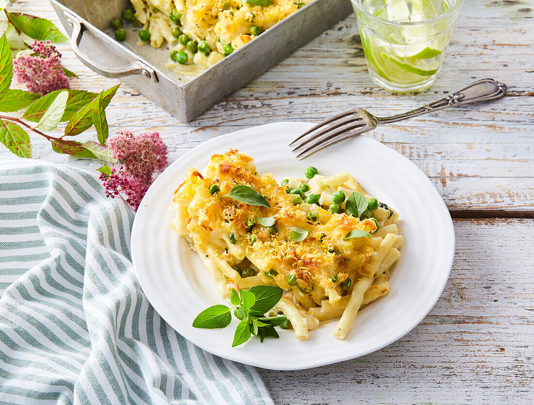 Baked pasta with peas and spinach