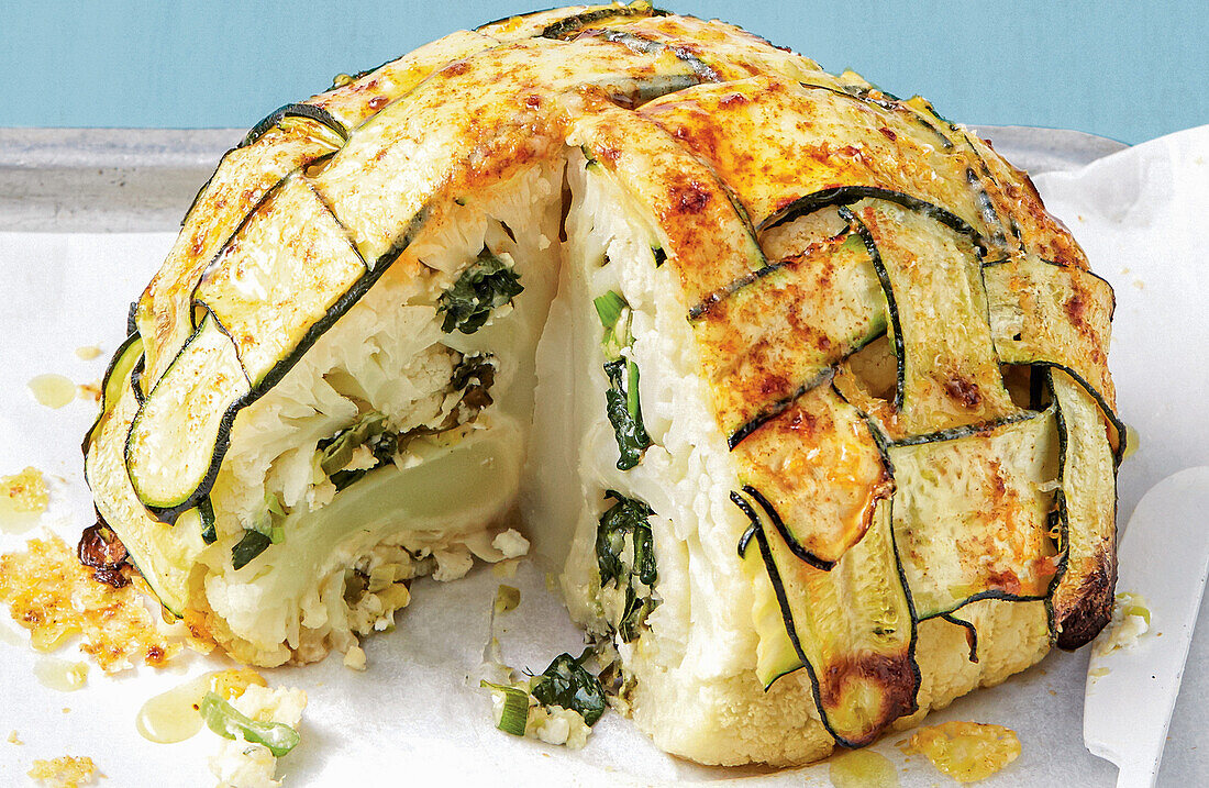 Cauliflower stuffed with cheese and wrapped in courgette