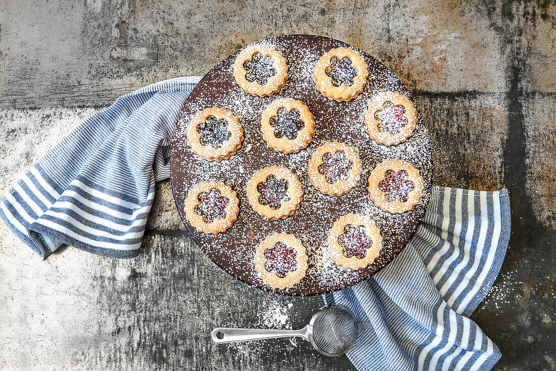 Linzer cookies with powdered sugar