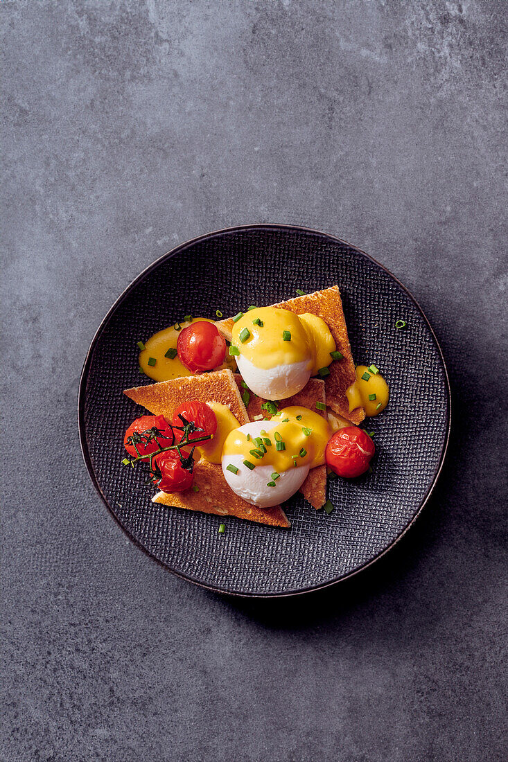 Egg Benedict with tomatoes