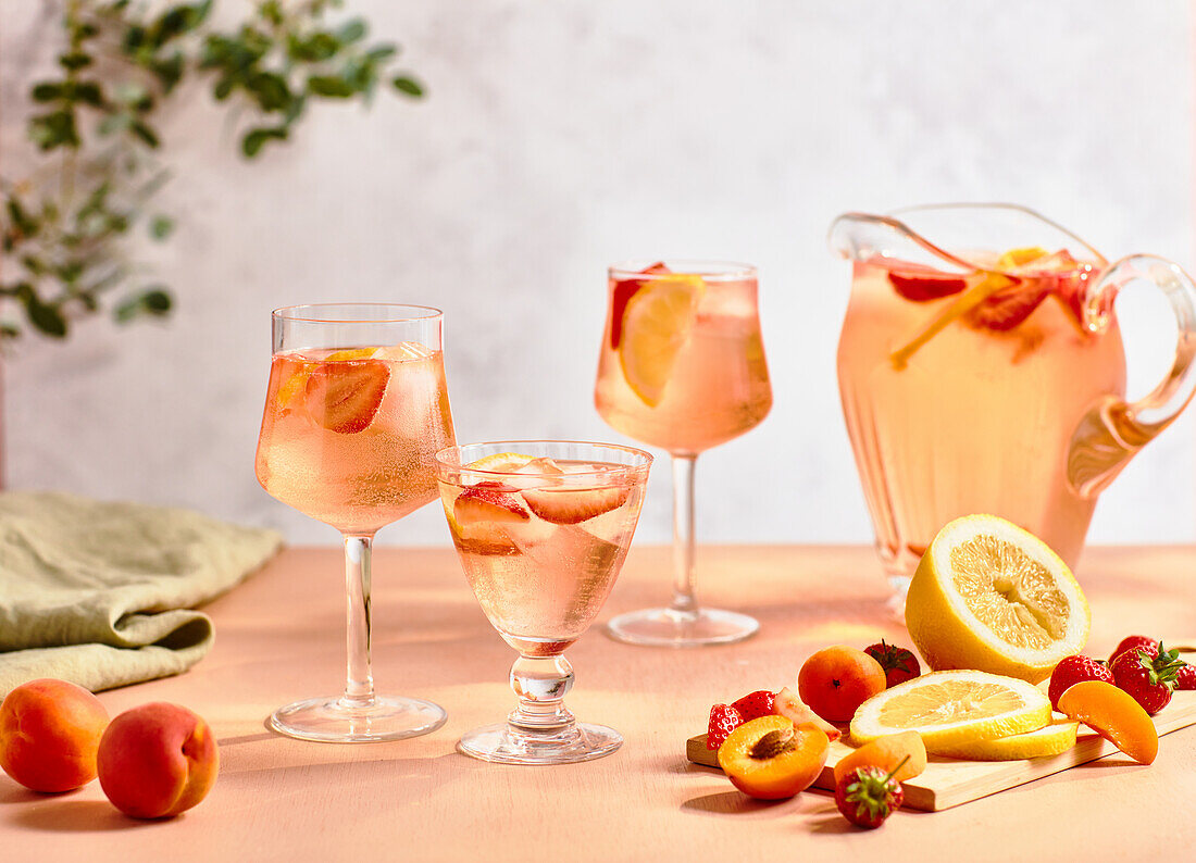 Sangria made from rosé wine with strawberries, apricots and peaches