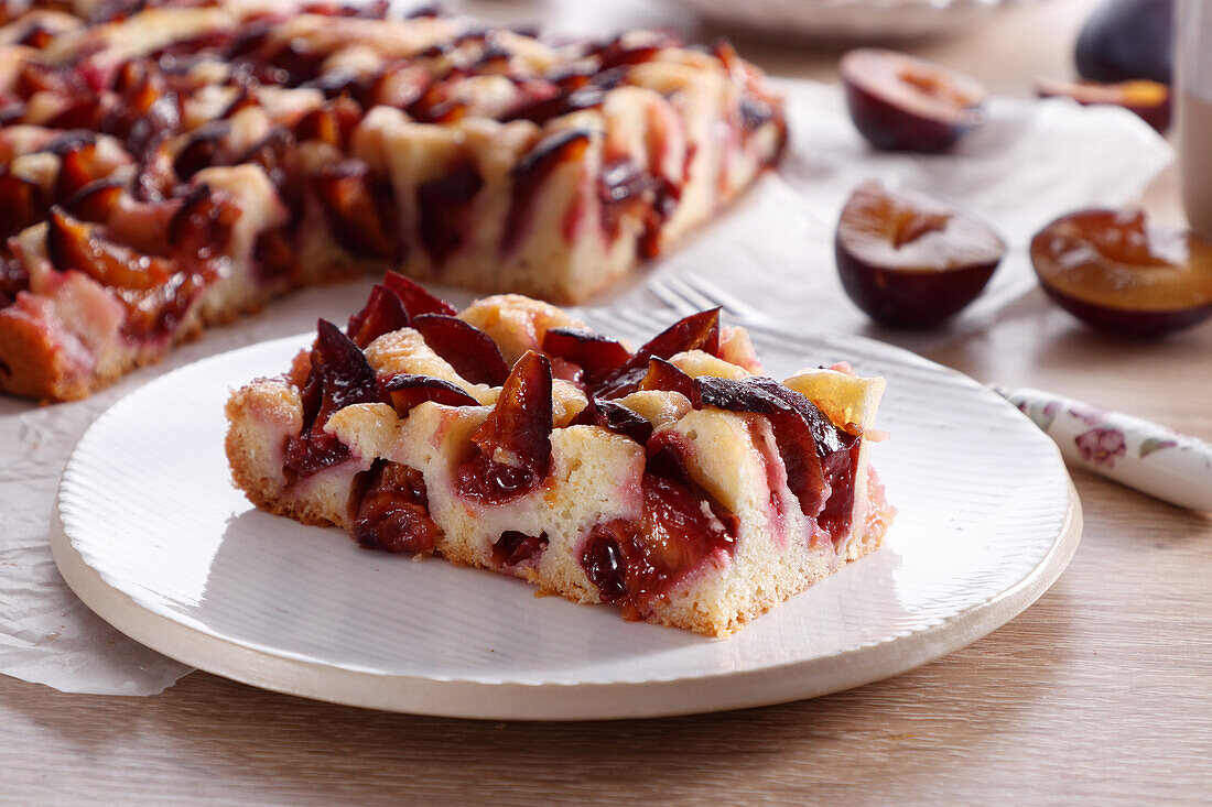 Sunken plum sheet cake