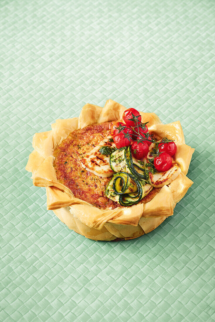 Zucchini fillo pastry quiche with grilled halloumi and tomatoes