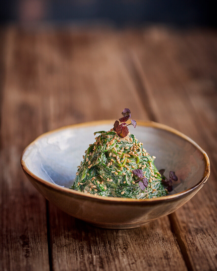 Asian spinach with daikon cress and sesame seeds