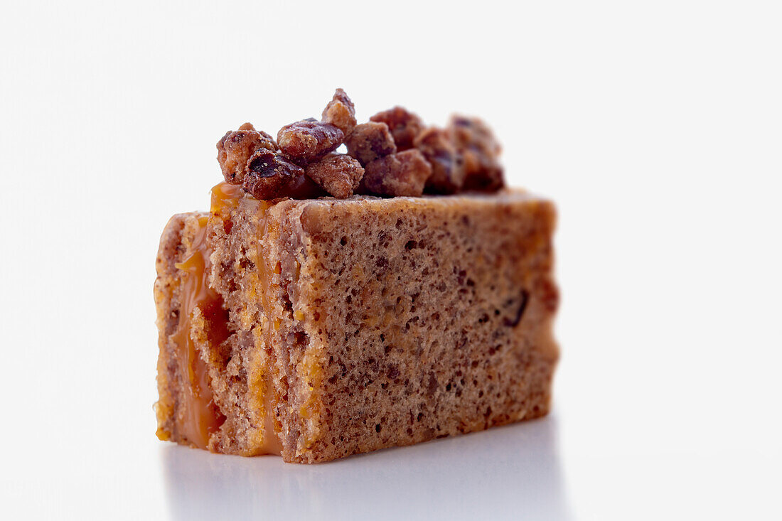 Caramel cake with candied pecans