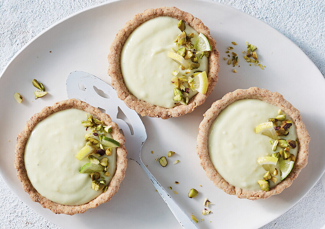 Vegan lemon tartlets with pistachios