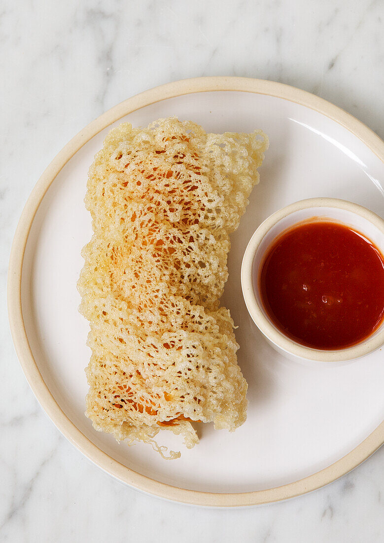 Chinese spring rolls with sweet and sour sauce