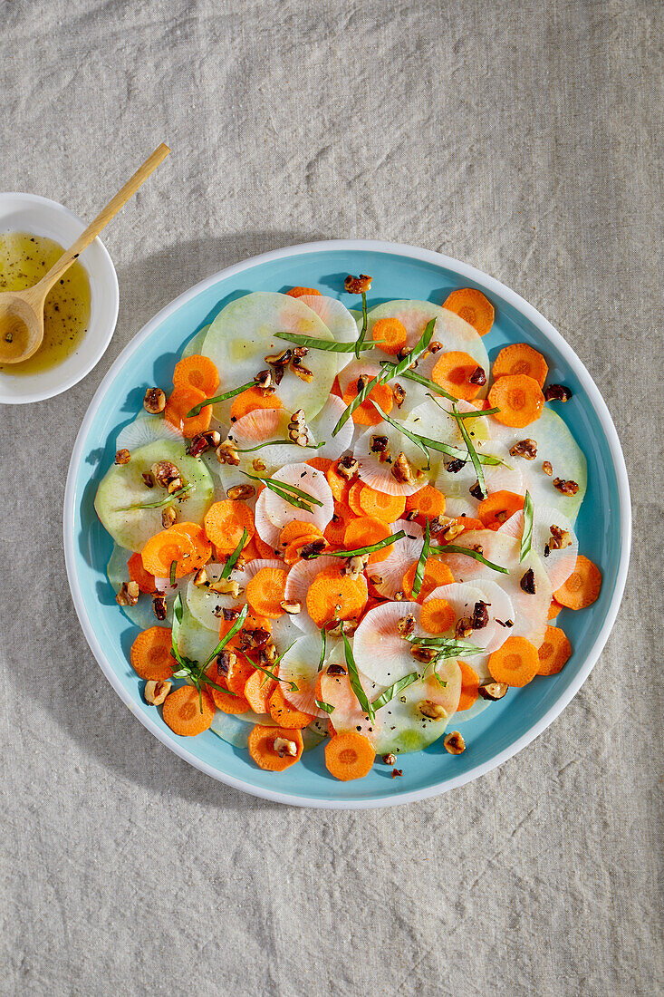 Vegetable carpaccio with nut crunch