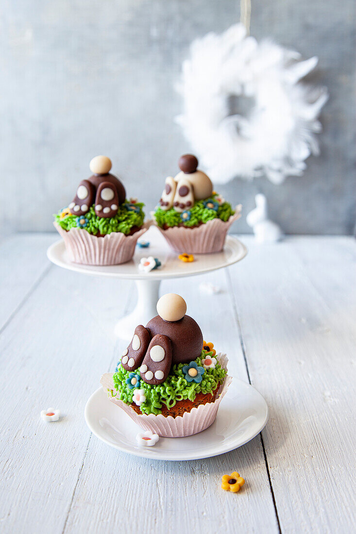 Easter cupcakes with 'diving' chocolate bunnies