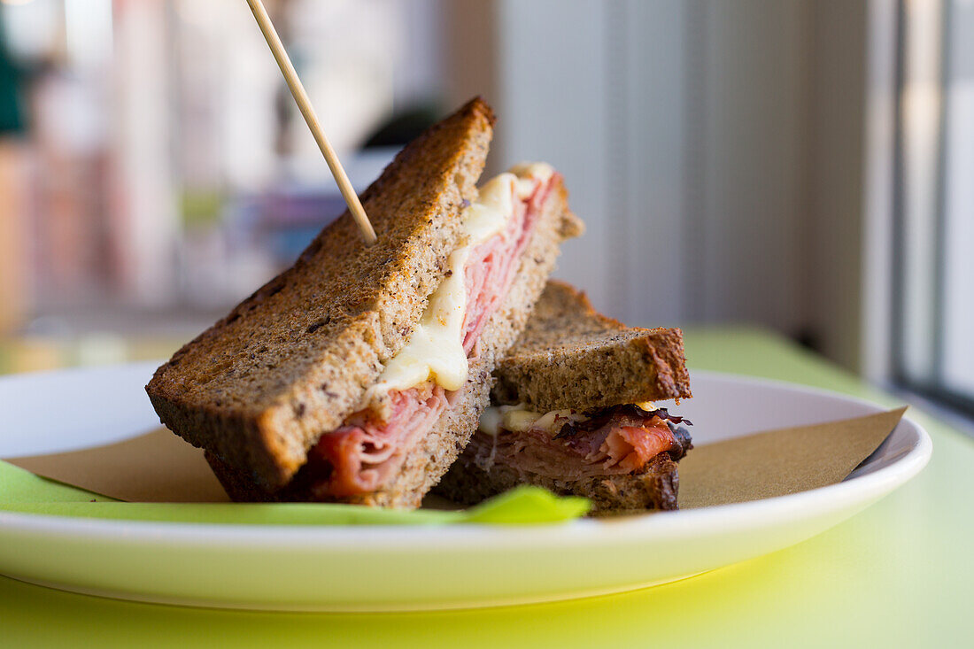 Rye toast sandwich with cheese and cooked ham