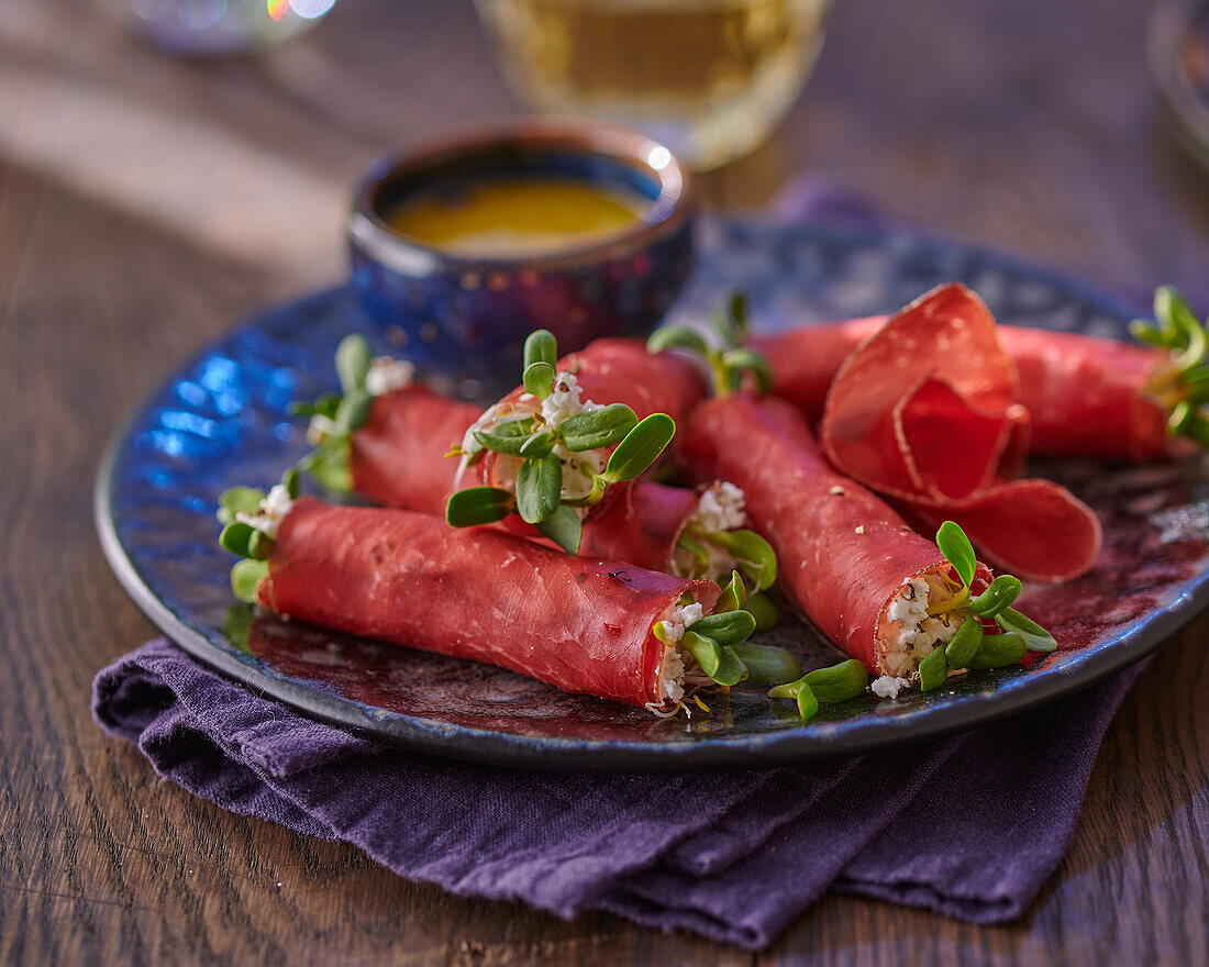 Bündner meat rolls filled with goat's cream cheese