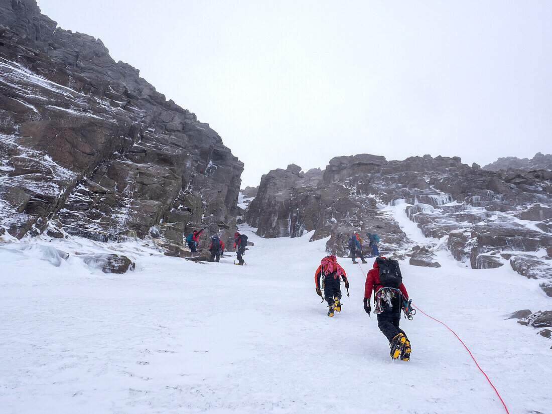 Climbers in the Cairngorm mountains, Scotland, UK