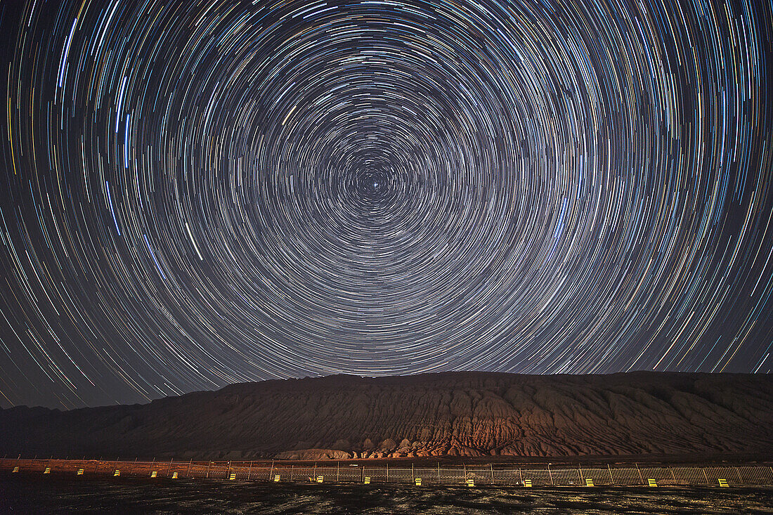 Star trails above Flaming Mountains, Xinjiang, China