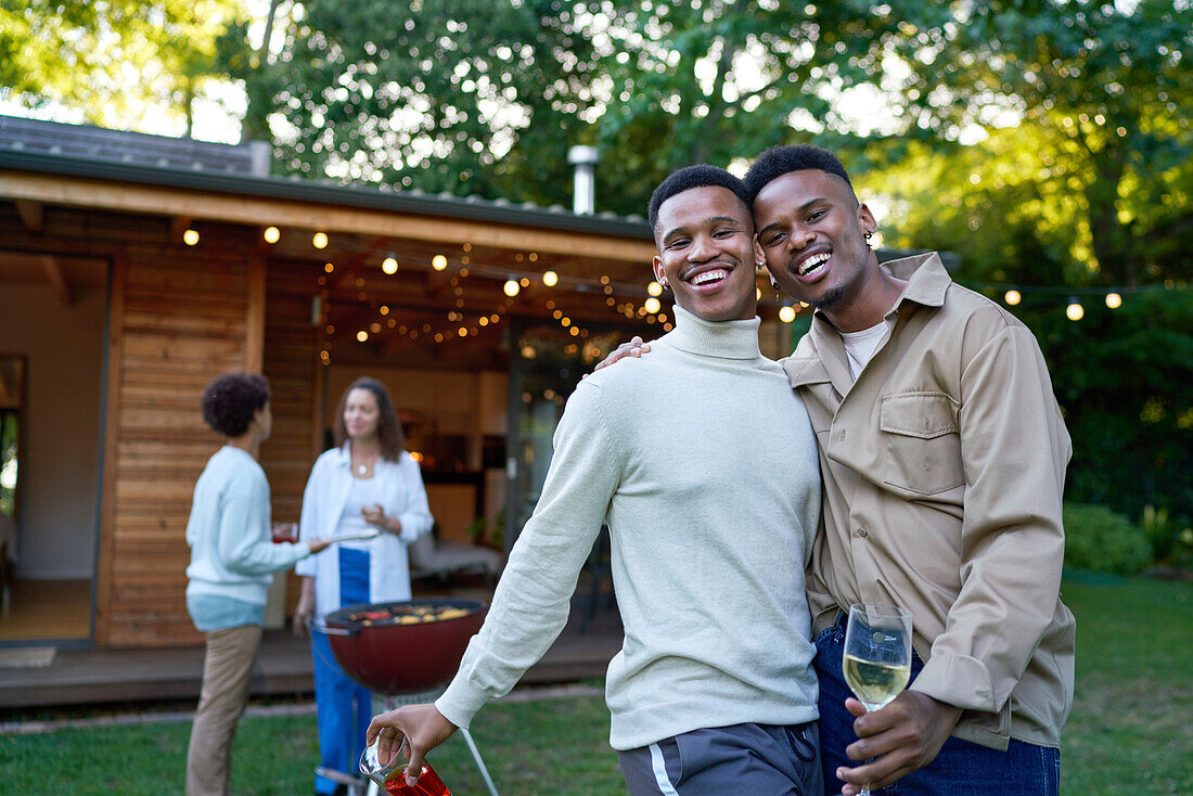 Gay couples enjoying barbecue