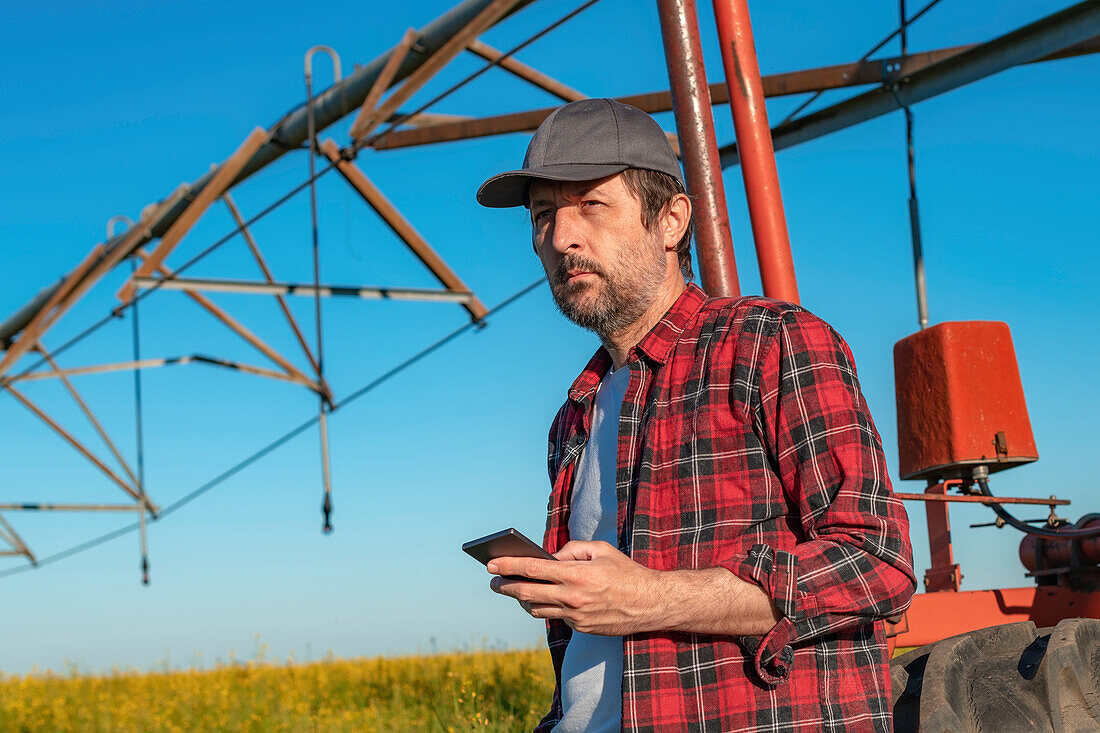 Farmer using smart phone