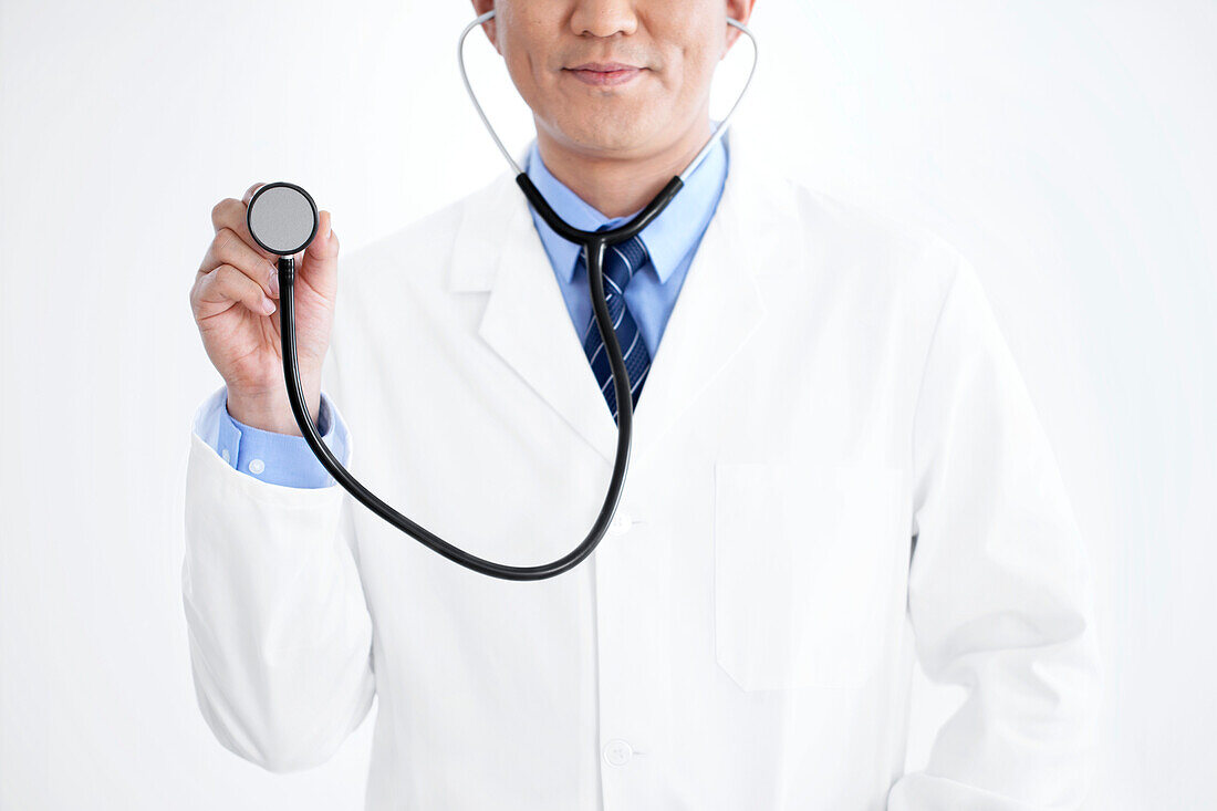 Doctor using stethoscope