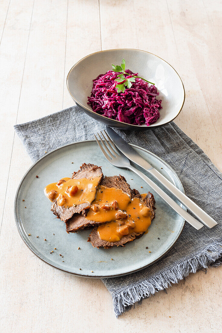 Sauerbraten with sultana sauce and red cabbage