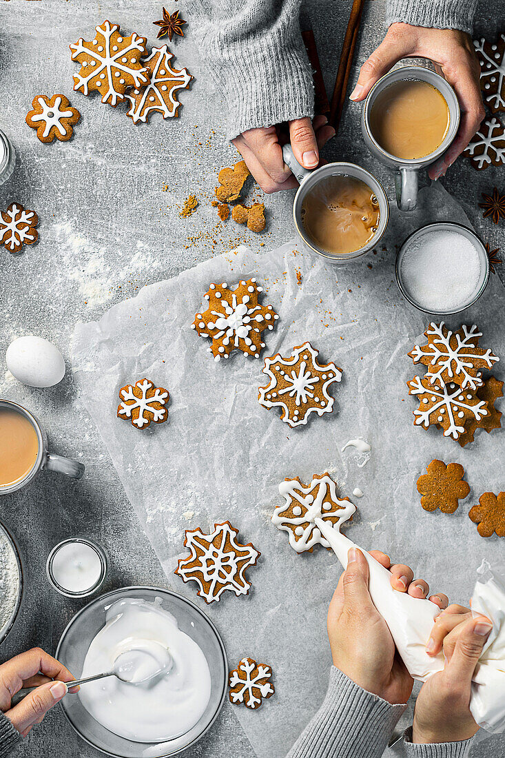 Gingerbread snowflake biscuits with icing