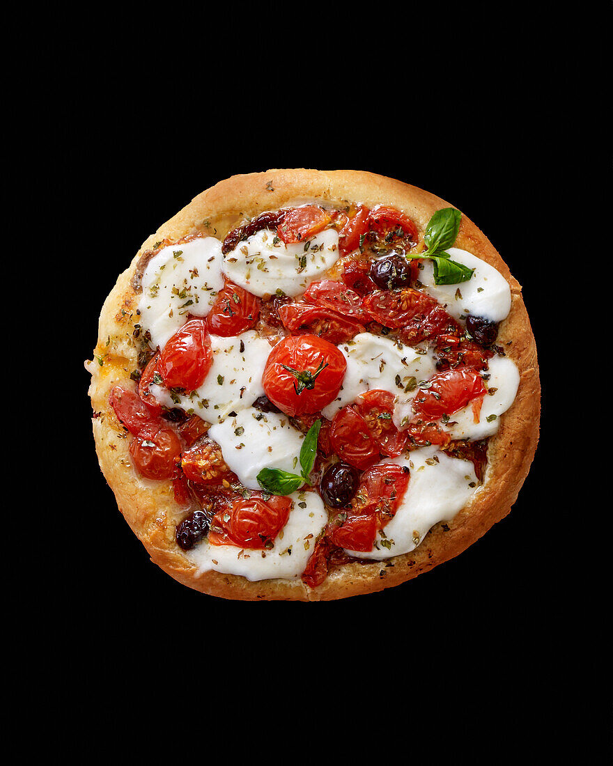 Pizza with cherry tomatoes, olives and mozzarella