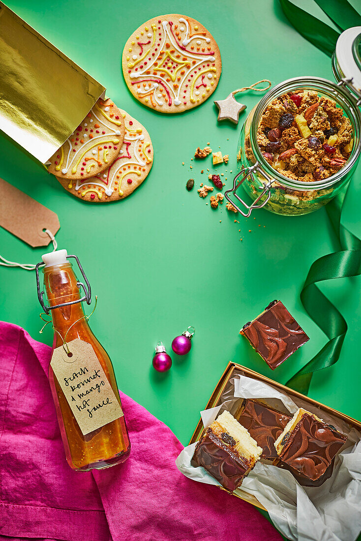 Spicy scotch bonnet mango sauce, apple cardamom ginger granola, rum sultana cake