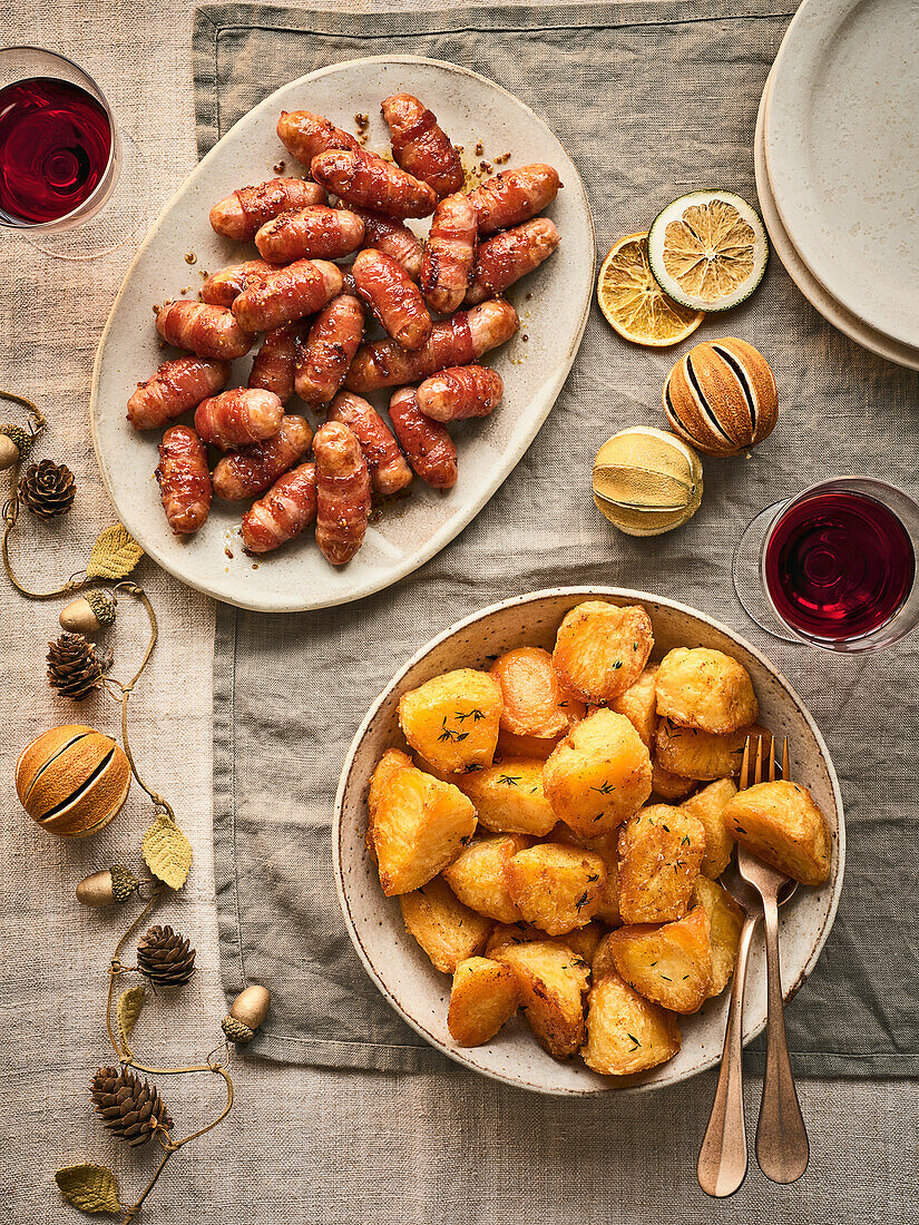 Bacon sausages and herb roast potatoes