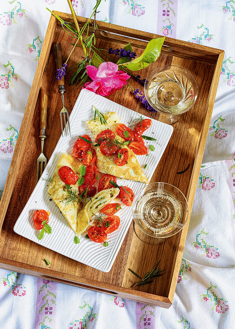 French omelette with herbs and tomatoes