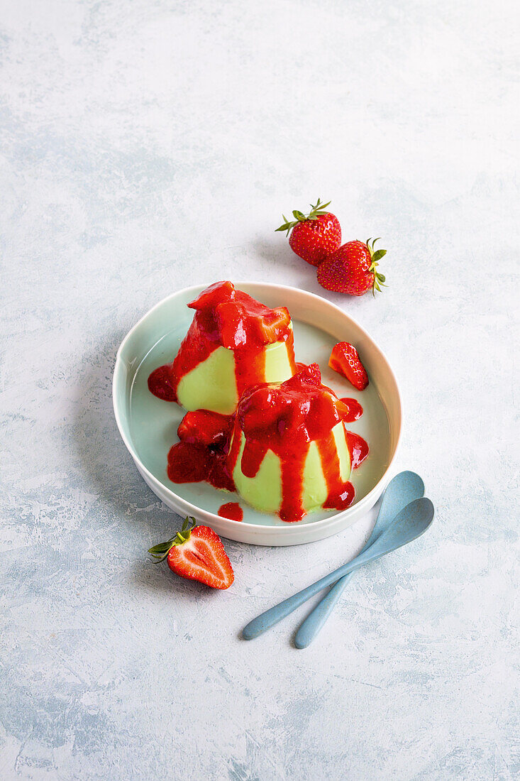 Jasmine tea pannacotta with strawberry sauce