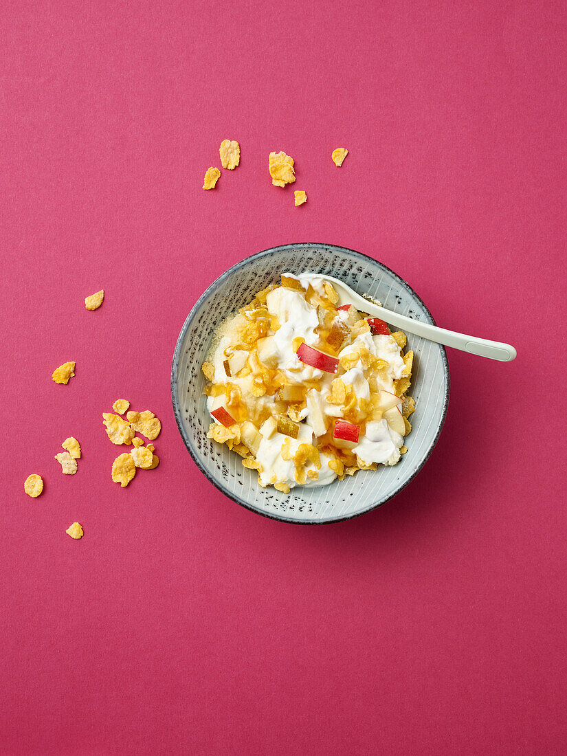 Cornflakes muesli with apple and almonds