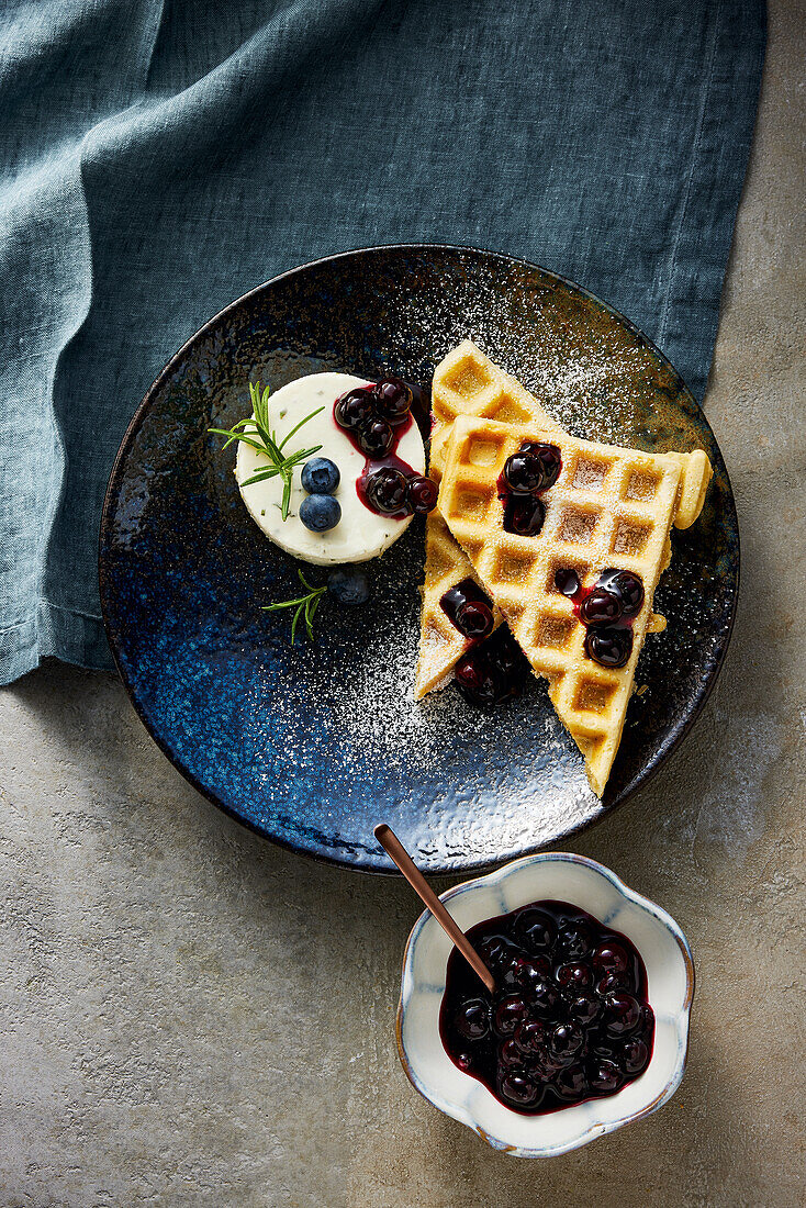 Waffles with blueberry sauce and honey-rosemary mousse