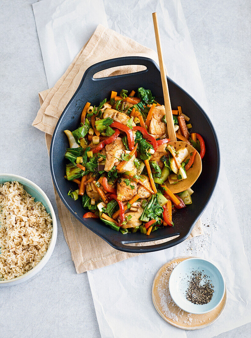 Asian wok with fried cod