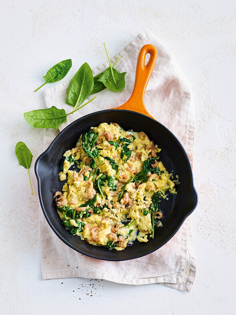 Scrambled crab eggs with spinach