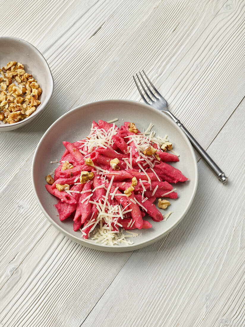 Beetroot pasta with walnuts and parmesan