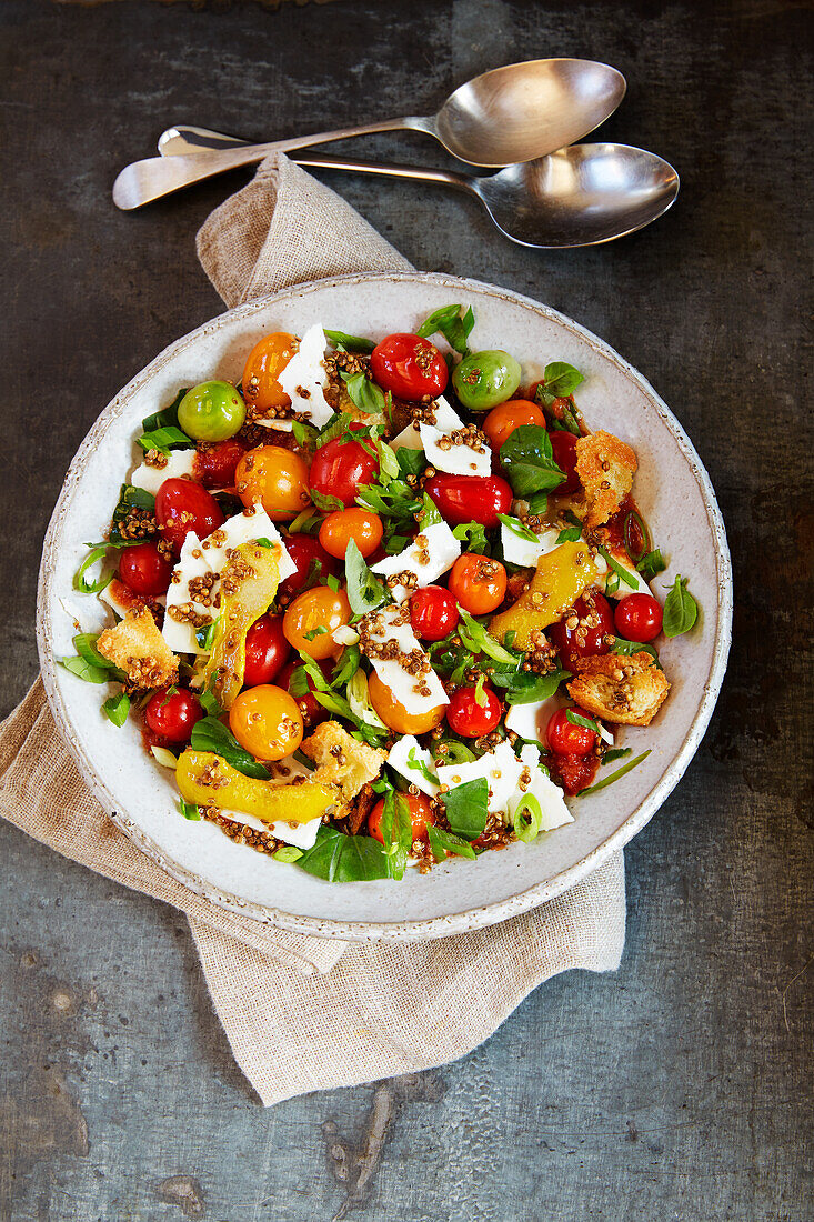 Tomato and ricotta salad with coriander seeds