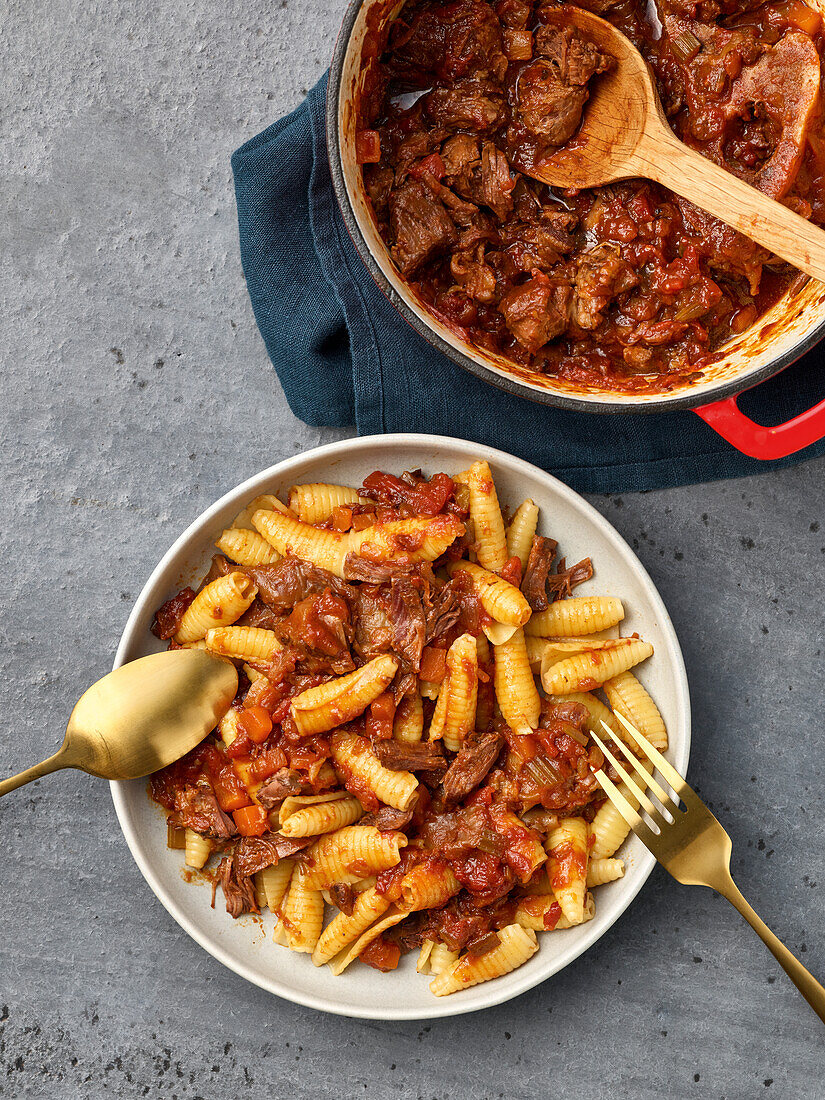 Pasta with ragù alla bolognese made from braised leg slices