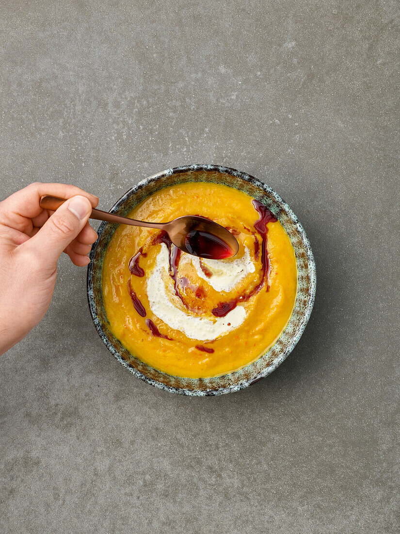 Vegan pumpkin soup with creamy coconut milk