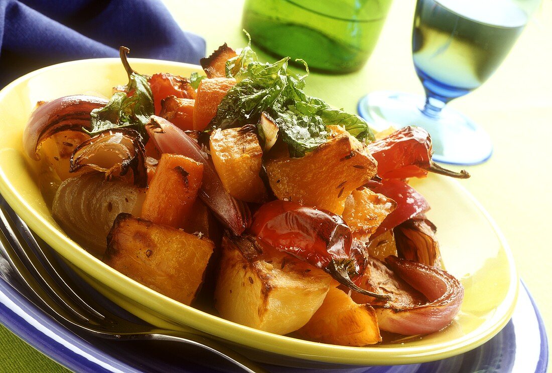 Baked autumn vegetables (potatoes, onions, carrots, pumpkin)